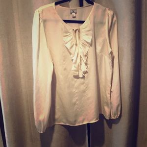 White ruffled blouse